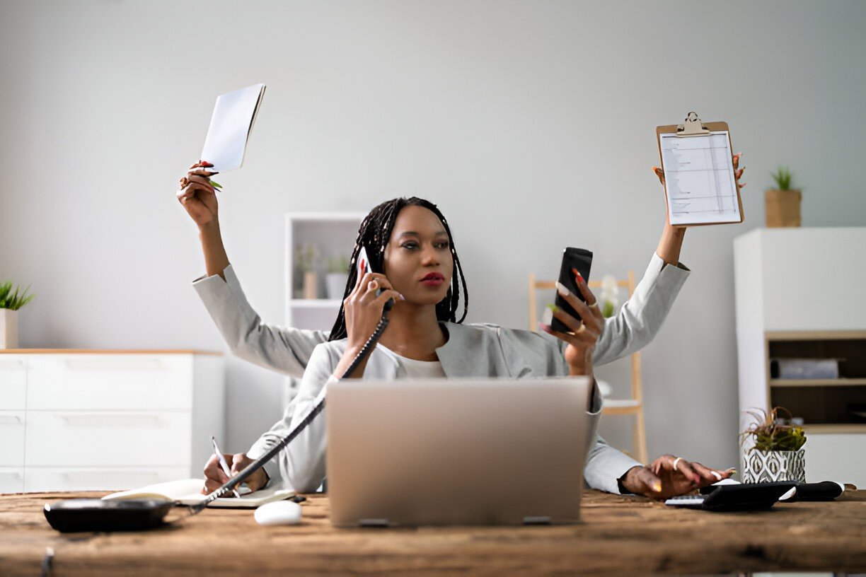 a business women doing multitasking in office